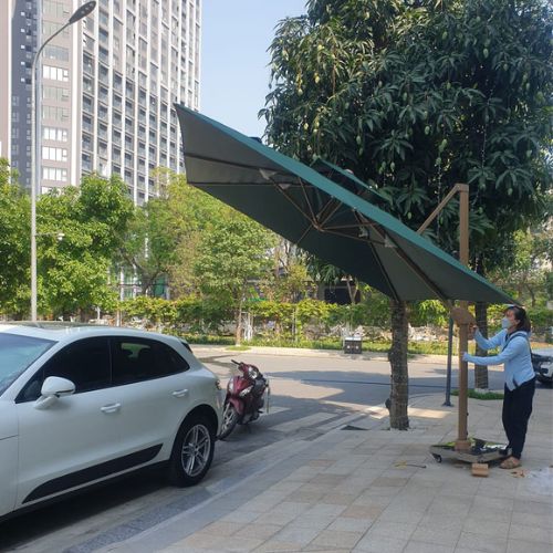 Dù hòa phát lệch tâm vuông 3m hợp kim nhôm xoay 360 màu xanh